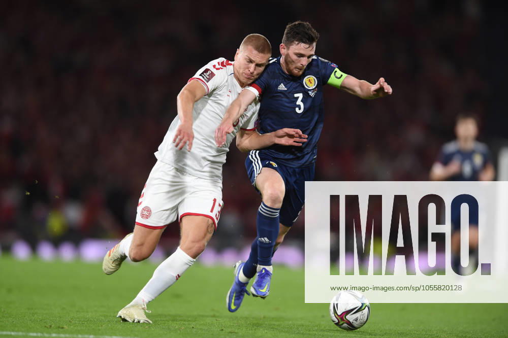 Scotland v Denmark - FIFA World Cup, WM, Weltmeisterschaft, Fussball qualifying - European - Hampden Park November 15, 2021, Glasgow, United Kingdom: Glasgow, Scotland, 15th November 2021. Rasmus Kristensen of Denmark and Andrew Robertson of Scotland during the FIFA World Cup qualifiers match at Hampden Park, Glasgow. Picture credit should read: Neil Hanna Sportimage Glasgow United Kingdom