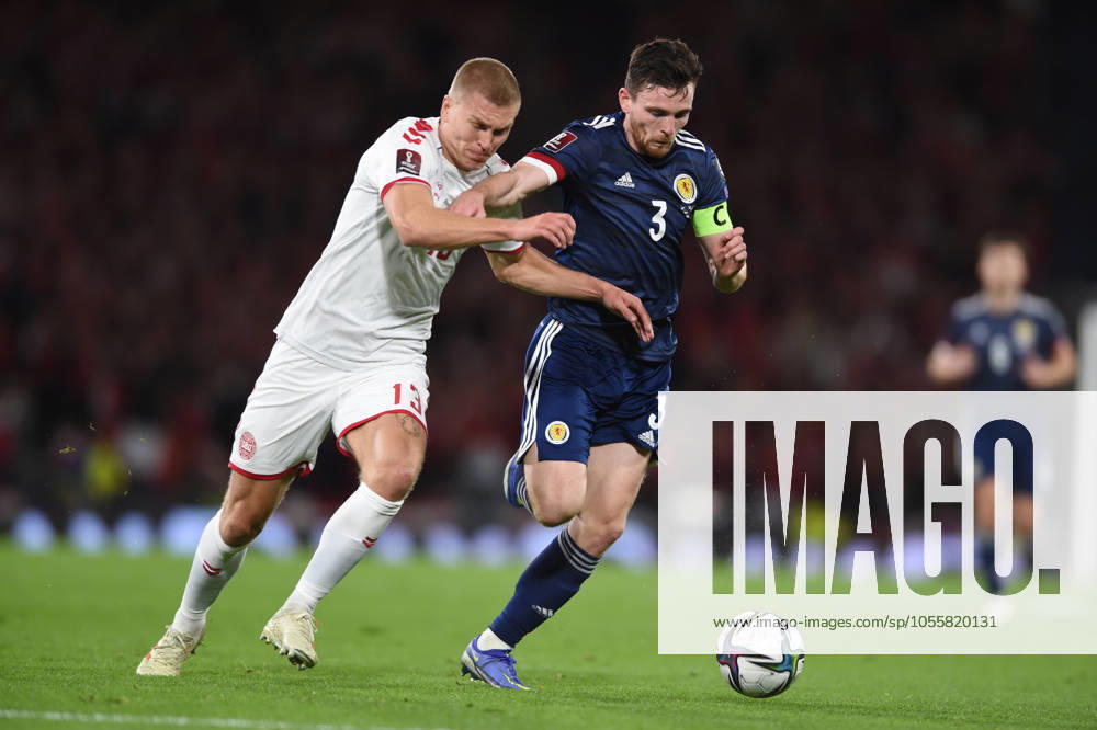 Scotland v Denmark - FIFA World Cup, WM, Weltmeisterschaft, Fussball qualifying - European - Hampden Park November 15, 2021, Glasgow, United Kingdom: Glasgow, Scotland, 15th November 2021. Rasmus Kristensen of Denmark and Andrew Robertson of Scotland during the FIFA World Cup qualifiers match at Hampden Park, Glasgow. Picture credit should read: Neil Hanna Sportimage Glasgow United Kingdom
