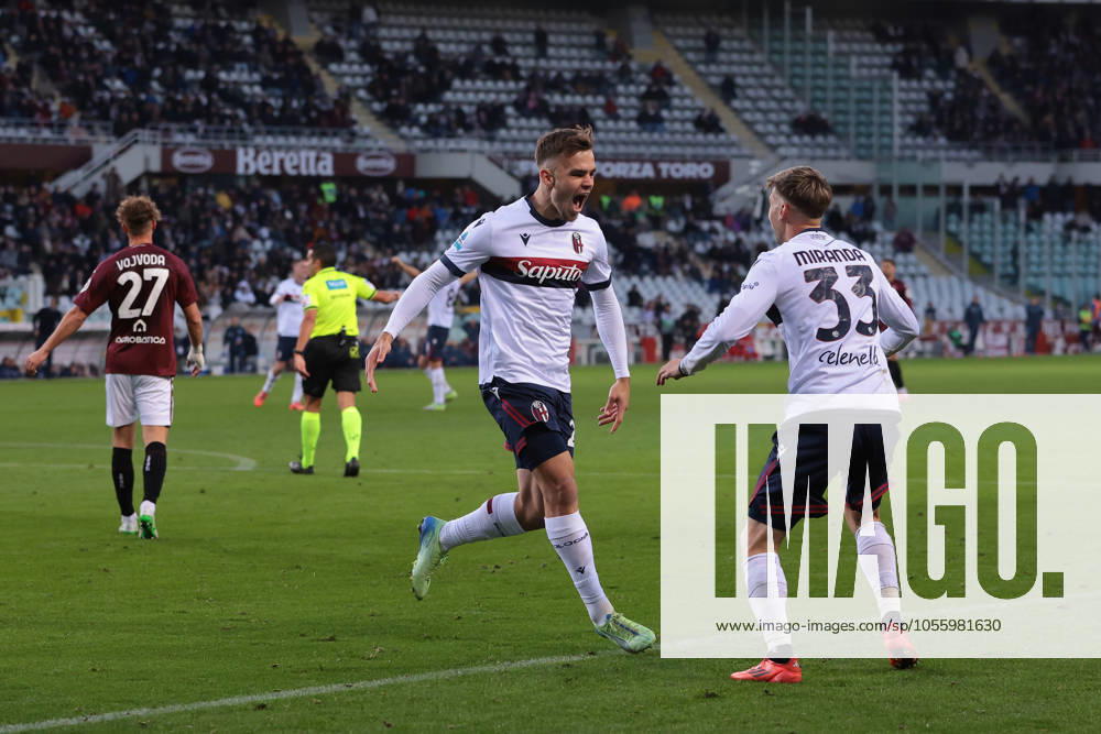 Turin, Italy, 21st December 2024. Thijs Dallinga of Bologna FC celebrates with team mate Juan Miranda after scoring to give the side a 1-0 lead during the Serie A match at Stadio Grande Torino, Turin. Picture credit should read: Jonathan Moscrop Sportimage . SPI-3533-0017