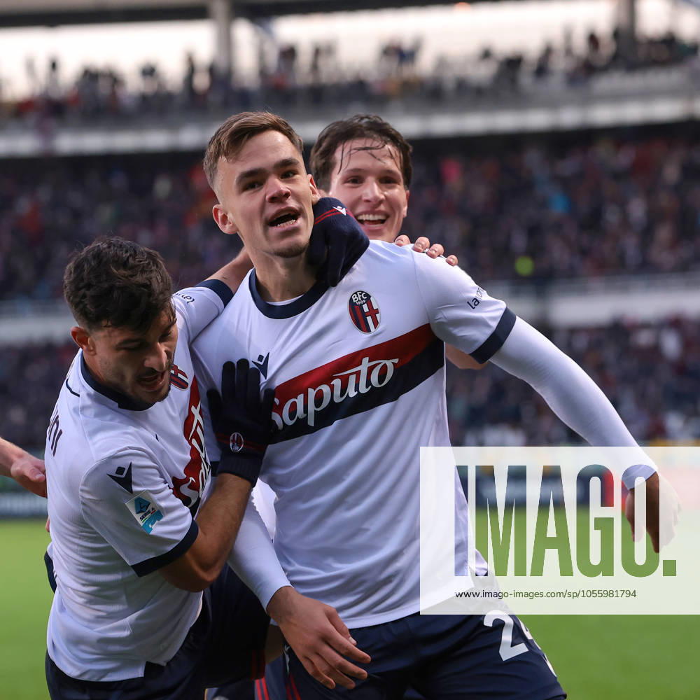 Turin, Italy, 21st December 2024. Thijs Dallinga of Bologna FC celebrates with team mates Riccardo Orsolini and Juan Miranda after scoring to give the side a 1-0 lead during the Serie A match at Stadio Grande Torino, Turin. Picture credit should read: Jonathan Moscrop Sportimage . SPI-3533-0022