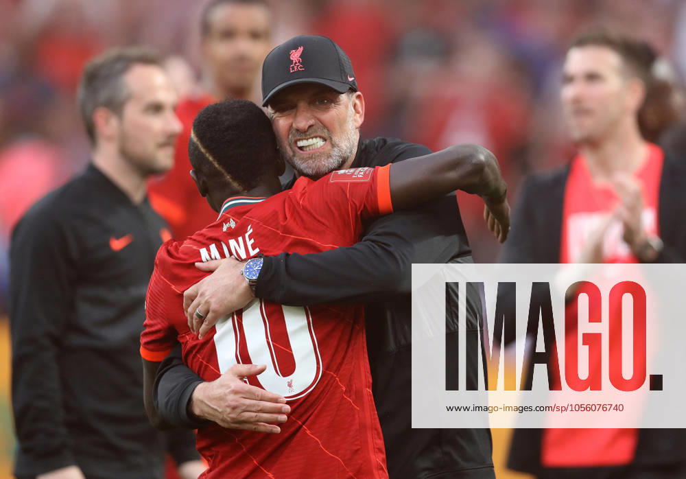 Chelsea v Liverpool - Emirates FA Cup - Final - Wembley Stadium May 14, 2022, London, United Kingdom: London, England, 14th May 2022. Sadio ManoÂ of Liverpool and Jurgen Klopp, Manager of Liverpool celebrate after the Emirates FA Cup match at Wembley Stadium, London. London United Kingdom