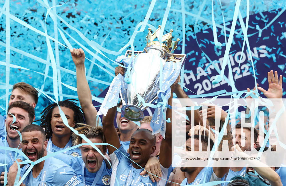 Manchester City v Aston Villa - Premier League - Etihad Stadium May 22, 2022, Manchester, United Kingdom: Manchester, England, 22nd May 2022. Fernandinho of Manchester City lifts the Premier league trophy after the Premier League match at the Etihad Stadium, Manchester. Manchester United Kingdom
