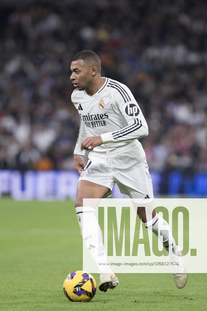 LA LIGA EA Sports - Real Madrid vs Sevilla MADRID, SPAIN - December 22: Kylian Mbappe of Real Madrid in action during the La Liga 2024 25 match between Real Madrid and Sevilla at Santiago Bernabeu Stadium. (Photo by Guillermo Martinez) Madrid Santiago Bernabà u Stadium Spain