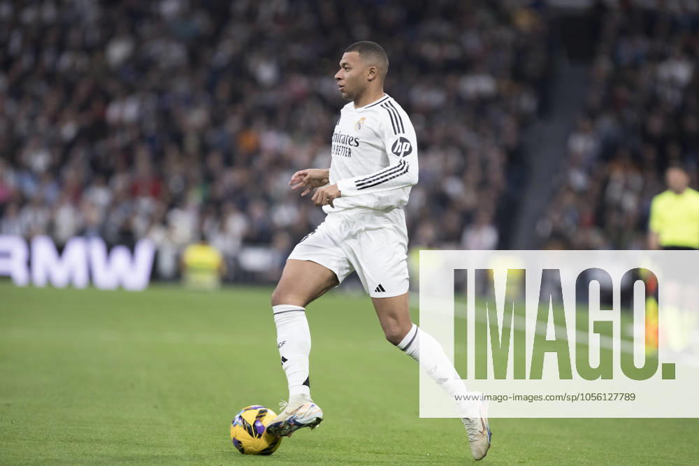 LA LIGA EA Sports - Real Madrid vs Sevilla MADRID, SPAIN - December 22: Kylian Mbappe of Real Madrid in action during the La Liga 2024 25 match between Real Madrid and Sevilla at Santiago Bernabeu Stadium. (Photo by Guillermo Martinez) Madrid Santiago Bernabà u Stadium Spain