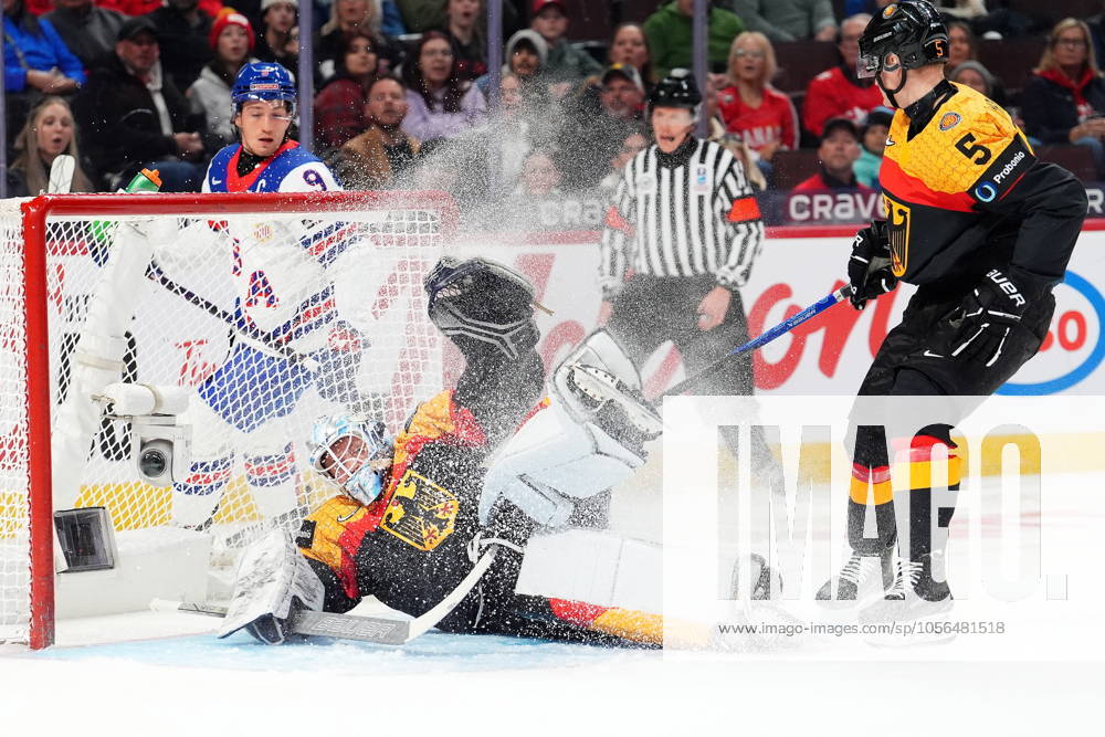 Germany goaltender Nico Pertuch (1) makes a save during first period IIHF World Junior Hockey Championship preliminary round action against the United States, in Ottawa on Thursday, Dec. 26, 2024. Canada News - December 26, 2024 - ZUMAc35_ 20241226_zaf_c35_030