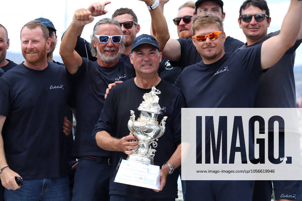 KW52 SYDNEY HOBART YACHT RACE, Skipper of Celestial V70, Sam Haynes and crew, has been presented with the Tattersalls Cup for overall honours in the Sydney to Hobart yacht race, Hobart waterfront, Hobart, Sunday, December 29, 2024. NSW yacht Celestial V70 Tattersalls Cup has been presented with the Tattersalls Cup as handicap winner of the 2024 Sydney to Hobart race, which has been marred by the death of two competitors on a rough first night of sailing. ( NO ARCHIVING, , NO USE IN BOOKS WITHOUT CONSENT HOBART TAS AUSTRALIA