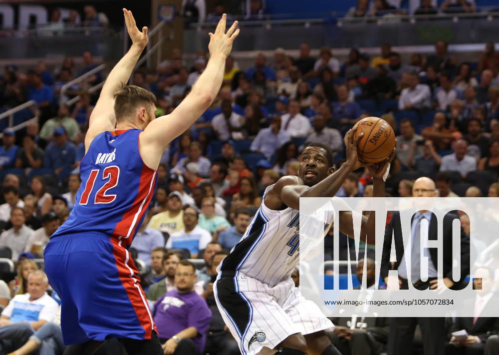 Detroit Pistons at Orlando Magic Orlando forward Andrew Nicholson (44) pump fakes while defended by Detroit center Aron Baynes (12) on Wednesday, April 6, 2016, at the Amway Center in Orlando, Fla. (Charles King Orlando Sentinel TNS) Orlando FL USA