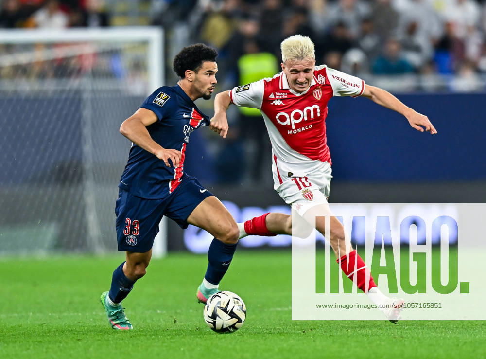 French Super Cup (Trophee des Champions) - Paris Saint-Germain vs AS Monaco Warren Zaire-Emery (L) of Paris Saint-Germain and Aleksandr Golovin of AS Monaco in action during the French Super Cup (Trophee des Champions) football final match between Paris Saint-Germain (PSG) and AS Monaco at the 974 stadium in Doha, Qatar on January 5, 2025.