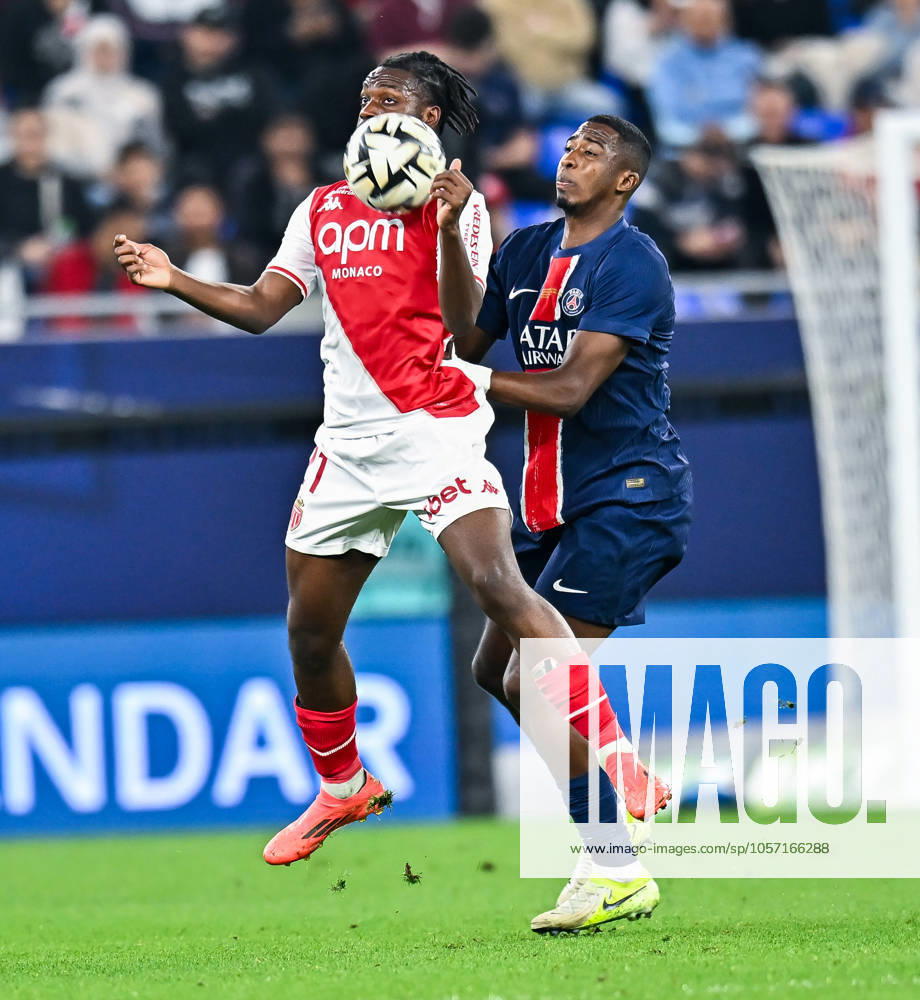 French Super Cup (Trophee des Champions) - Paris Saint-Germain vs AS Monaco Nuno Mendes (R) of Paris Saint-Germain and George Ilenikhena of AS Monacoin action during the French Super Cup (Trophee des Champions) football final match between Paris Saint-Germain (PSG) and AS Monaco at the 974 stadium in Doha, Qatar on January 5, 2025.