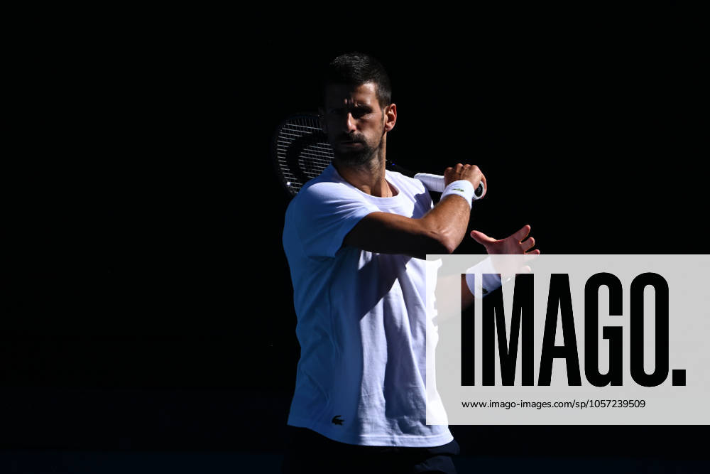 TENNIS AO CHARITY SINNER POPYRIN, Novak Djokovic of Serbia in action during a training session at the Australian Open tennis tournament at Melbourne Park in Melbourne, Tuesday, January 7, 2025. ( NO ARCHIVING, , NO USE IN BOOKS WITHOUT CONSENT MELBOURNE VICTORIA AUSTRALIA