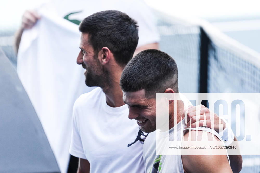 NOVAK DJOKOVIC of Serbia and CARLOS ALCARAZ of Spain at a practice session prior to the start of the 2025 Australian Open in Melbourne, Australia. Cal Media Melbourne Australia - ZUMAc04_ 20250107_faf_c04_024