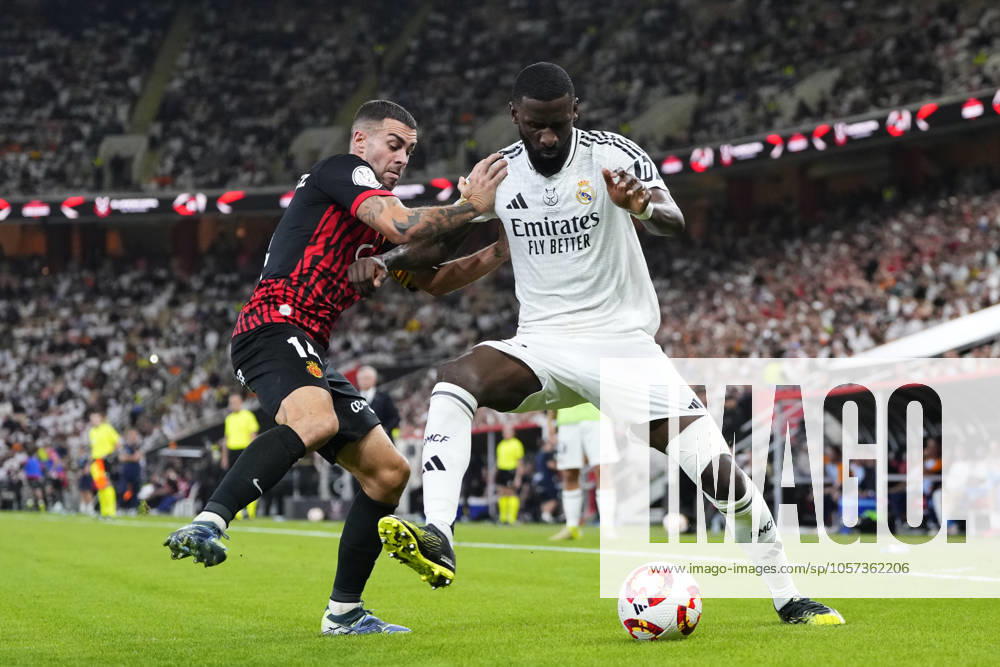 KW02 Real Madrid v RCD Mallorca: Spanish Super Cup Antonio Rudiger centre-back of Real Madrid and Germany and Dani Rodriguez attacking midfield of Mallorca and Spain compete for the ball during the Spanish Super Cup semi-final match between Real Madrid and RCD Mallorca at King Abdullah Sports City on January 9, 2025 in Jeddah, Saudi Arabia. Jeddah Saudi Arabia