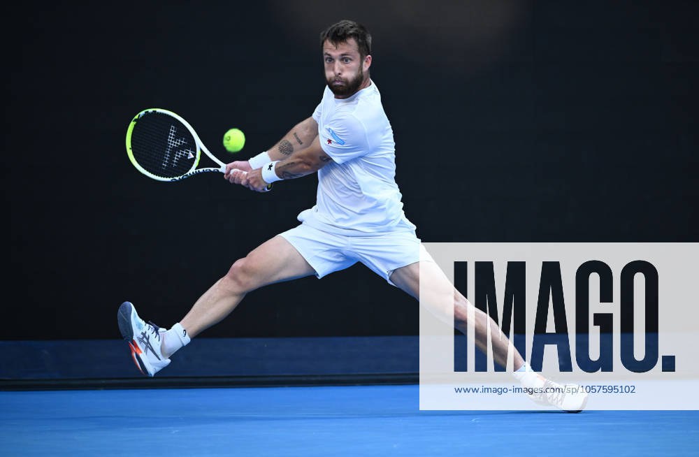 TENNIS AUSTRALIAN OPEN, Corentin Moutet of France returns during his round 1 match against Alexei Popyrin of Australia during the 2025 Australian Open at Melbourne Park in Melbourne, Tuesday, January 14, 2025. ( NO ARCHIVING, , NO USE IN BOOKS WITHOUT CONSENT MELBOURNE VICTORIA AUSTRALIA