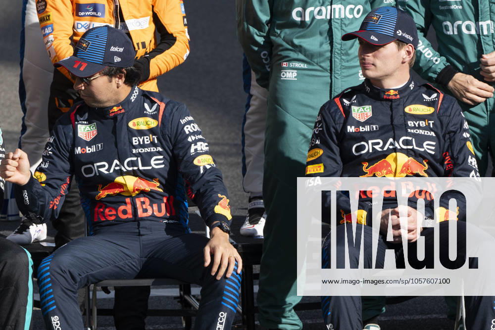 SERGIO PEREZ (MEX) of Oracle Red Bull Racing 11 and MAX VERSTAPPEN (NED) of Oracle Red Bull Racing 1 at the end of the F1 season during the 2024 Formula 1 Abu Dhabi Grand Prix at the Yas Marina Circuit. Abu Dhabi United Arab Emirates - ZUMAb177 20241220_aap_b177_057
