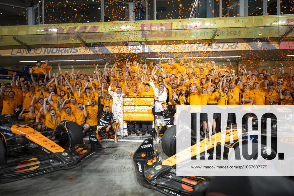 McLaren Racing Team mechanics, engineers and staff celebrate winning the 2024 World Constructors Championship (WCC) with drivers LANDO NORRIS and OSCAR PIASTRI as well as Bahraini officials during race day at the end of the F1 season during the 2024 Formula 1 Abu Dhabi Grand Prix at the Yas Marina Circuit. Abu Dhabi United Arab Emirates - ZUMAb177 20241221_aap_b177_008