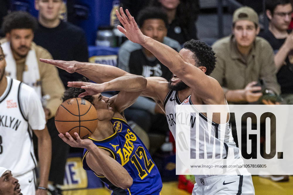 Los Angeles Lakers Max Christie 12 shoots under pressure from Brooklyn Nets Ben Simmons 10 during an NBA, Basketball Herren, USA basketball game at Crypto.com Arena on Friday, Jan. 17, 2025 in Los Angeles. Los Angeles USA - ZUMAc68_ 20250117_zaf_c68_052