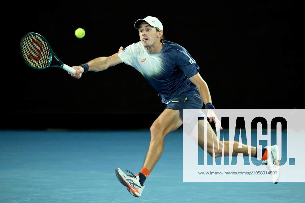 TENNIS AUSTRALIAN OPEN, Alex de Minaur of Australia returns during his quarterfinal match against Jannik Sinner of Italy during the 2025 Australian Open at Melbourne Park in Melbourne, Wednesday, January 22, 2025. ( NO ARCHIVING, , NO USE IN BOOKS WITHOUT CONSENT MELBOURNE VICTORIA AUSTRALIA