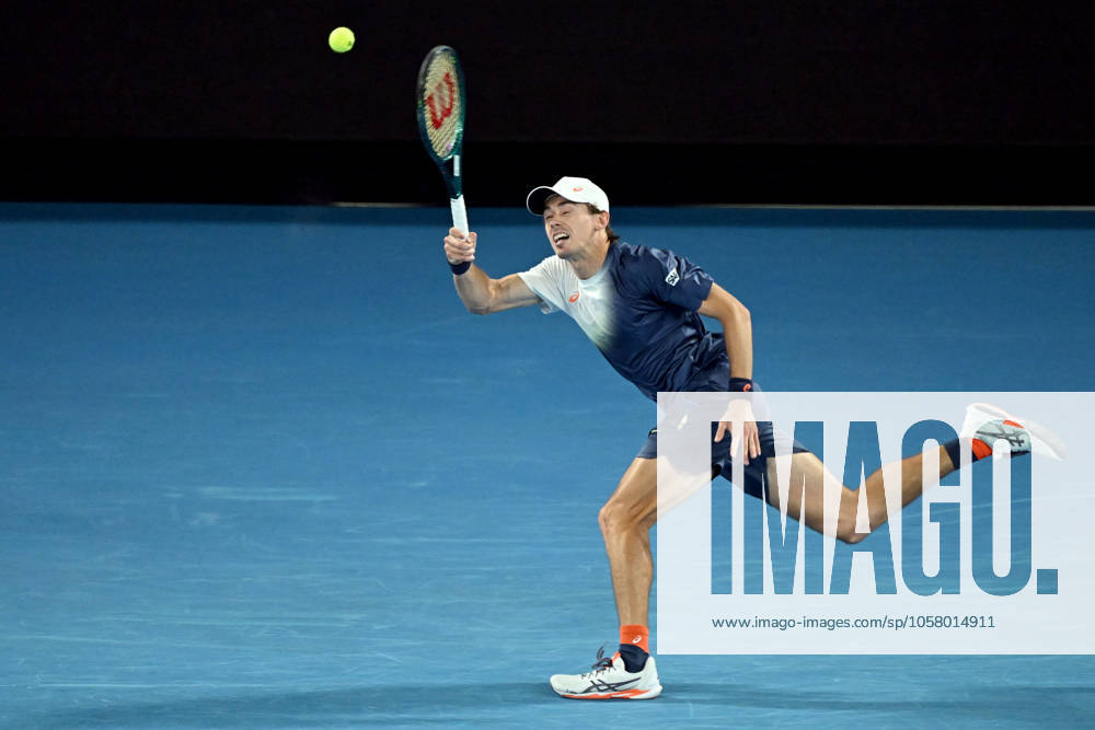 TENNIS AUSTRALIAN OPEN, Alex de Minaur of Australia returns during his quarterfinal match against Jannik Sinner of Italy during the 2025 Australian Open at Melbourne Park in Melbourne, Wednesday, January 22, 2025. ( NO ARCHIVING, , NO USE IN BOOKS WITHOUT CONSENT MELBOURNE VICTORIA AUSTRALIA