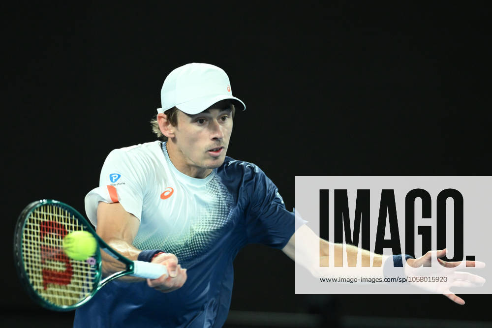 TENNIS AUSTRALIAN OPEN, Alex de Minaur of Australia returns during his quarterfinal match against Jannik Sinner of Italy during the 2025 Australian Open at Melbourne Park in Melbourne, Wednesday, January 22, 2025. ( NO ARCHIVING, , NO USE IN BOOKS WITHOUT CONSENT MELBOURNE VICTORIA AUSTRALIA