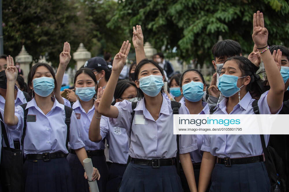 Pro-democracy protesters wearing school uniforms seen giving the three finger salute during an anti-government demonstration in the Thai Capital. Thousands of pro-democracy protesters took the streets at Victory Monument demanding the resignation of Thailand Prime Minister and the reform of the monarchy for the seventh day after a ˜severe state of emergency declared by Prime Minister Prayut Chan-o-cha. The protesters marched from Victory Monument to Government House and delivered a letter to Prime Minister Prayut Chan-o-cha asking him to resign before 3 days. The protest ended peacefully. Bangkok Thailand - ZUMAs197 20201021_zaa_s197_138