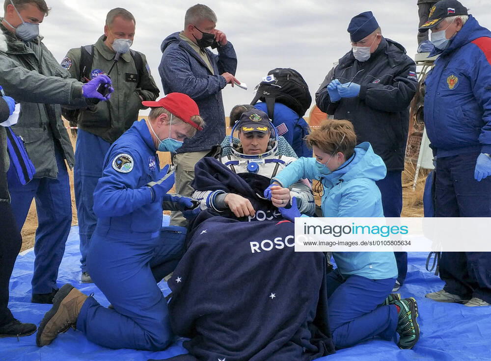 KW43 KAZAKHSTAN - OCTOBER 22, 2020: NASA astronaut Christopher Cassidy (C front) is tended to by ground personnel after the successful landing of the Soyuz MS-16 reentry capsule in the steppe southeast of Zhezkazgan. The ISS Expedition 63 crew including Cassidy and Roscosmos cosmonauts Anatoly Ivanishin and Ivan Vagner, has returned back to Earth. Rosaviatsiya TASS TS0EBA27