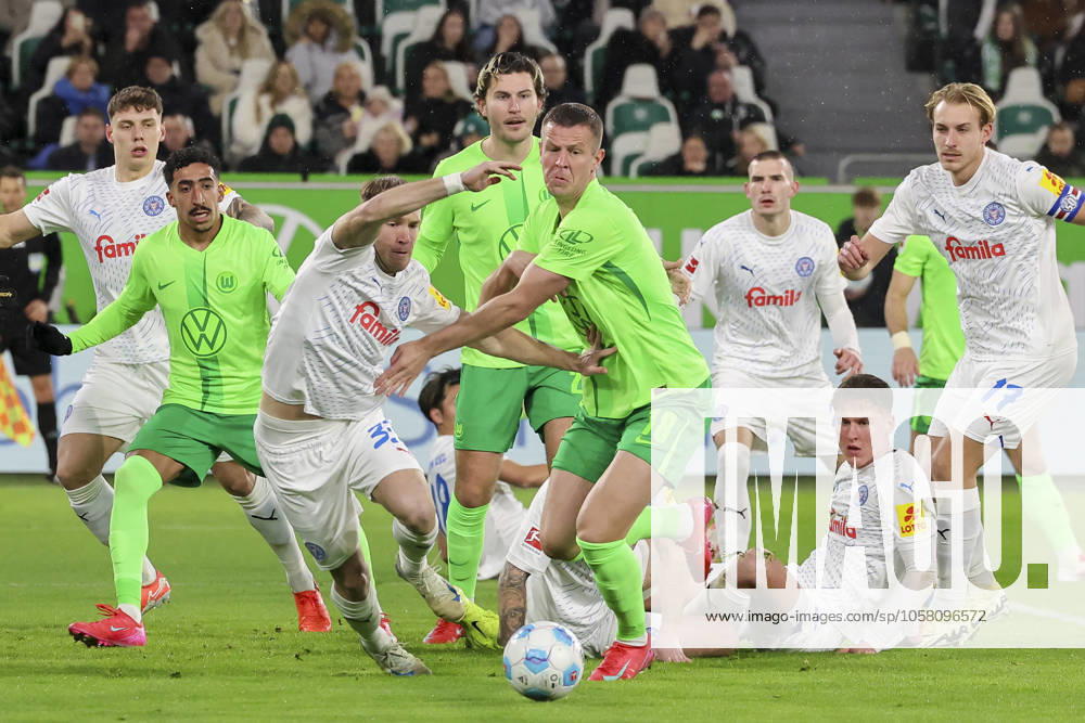 Dominik Javorcek Holstein Kiel and Denis Vavro VfL Wolfsburg battle for the ball, Bundesliga, VfL Wolfsburg v Holstein Kiel, Volkswagen Arena, January 24, 2025 in Wolfsburg, Germany Photo by Marco Steinbrenner DeFodi Images Dominik Javorcek Holstein Kiel and Denis Vavro VfL Wolfsburg battle for the ball, Bundesliga, VfL Wolfsburg v Holstein Kiel, Volkswagen Arena, January 24, 2025 in Wolfsburg, Germany Photo by Marco Steinbrenner DeFodi Images DFL regulations prohibit any use of photographs as image sequences and or quasi video Defodi 700 wolf kiel 20250124 042 Defodi-700 DFL regulations prohibit any use of photographs as image sequences and or quasi-video.