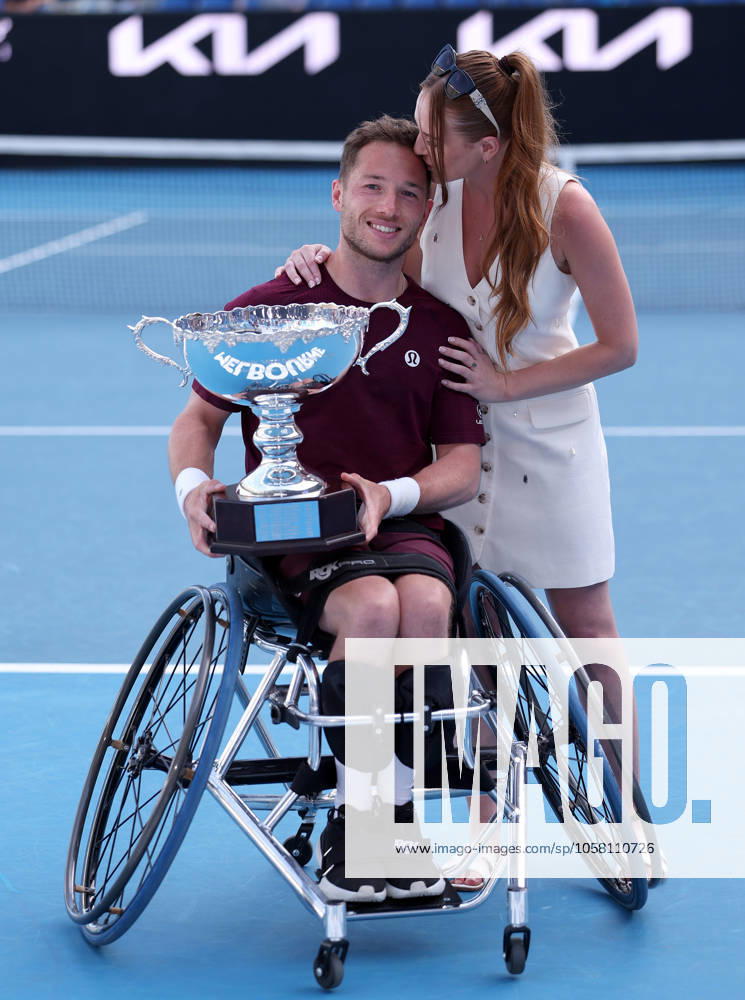 Alfie Hewett of GB kisses his wife whilst holding the trophy Australian Open, Day Fourteen, Tennis, Melbourne Park, Melbourne, Australia - 25 Jan 2025