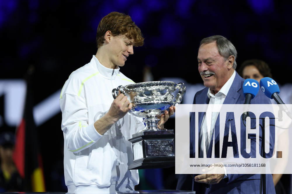Tennis legend John Newcombe hands the trophy to Jannik Sinner, Award ceremony, Presentation, Australian Open 2025, Melbourne Park, Melbourne, Victoria, Australia