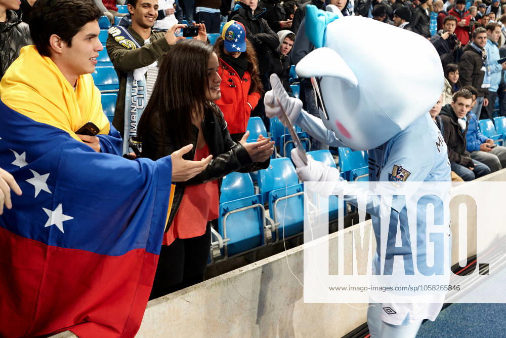 Manchester City FC v Real Madrid CF - UEFA Champions League A Manchester City mascot greets fans prior to the UEFA Champions League Group D soccer match between Manchester City and Real Madrid at the Etihad Stadium in Manchester, United Kingdom, on November 21, 2012. Manchester City and Borough of Manchester United, ManU Kingdom