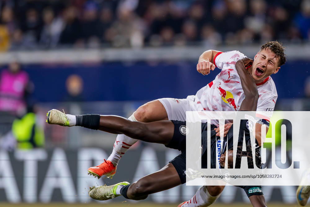 KW05 SOCCER - UEFA CL, Sturm vs RB Leipzig KLAGENFURT,AUSTRIA,29.JAN.25 - SOCCER - UEFA Champions League, SK Sturm Graz vs RasenBallsport Leipzig. Image shows Willi Orban (RB Leipzig) and Seedyahmed Jatta (Sturm). GEPAxpictures xMatthiasxTrinkl