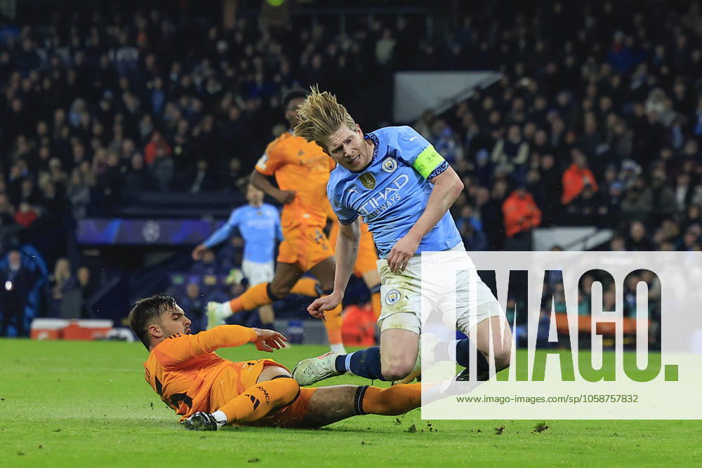 Manchester City v Real Madrid Champions League 11 02 2025. Kevin De Bruyne (17) of Manchester City is fouled by Raul Asencio (35) of Real Madrid during the Champions League match between Manchester City and Real Madrid at the Etihad Stadium, Manchester, England on 11 February 2025. Manchester Etihad Stadium Manchester England Editorial use only ,
