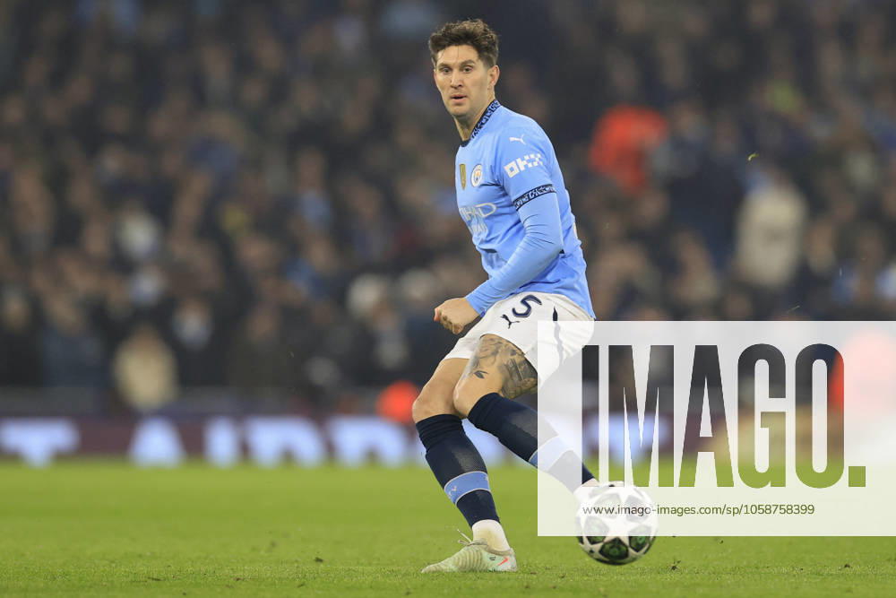 Manchester City v Real Madrid Champions League 11 02 2025. John Stones (5) of Manchester City passes the ball the Champions League match between Manchester City and Real Madrid at the Etihad Stadium, Manchester, England on 11 February 2025. Manchester Etihad Stadium Manchester England Editorial use only ,