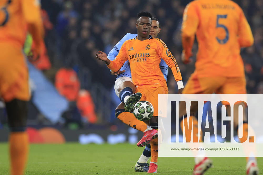 Manchester City v Real Madrid Champions League 11 02 2025. Vinicius Junior (7) of Real Madrid is challenged by Manuel Akanji (25) of Manchester City during the Champions League match between Manchester City and Real Madrid at the Etihad Stadium, Manchester, England on 11 February 2025. Manchester Etihad Stadium Manchester England Editorial use only ,