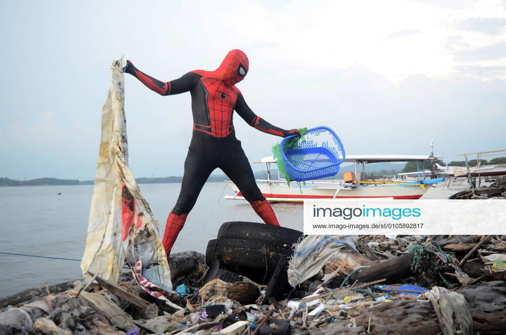 Spiderman clean the beach in Indonesia Rudi Hartono wearing a spiderman costume to clean a beach in Parepare City, South Sulawesi. The beach clean-up action is carried out every day to reduce the garbage in the sea. Parepare South Sulawesi Indonesia