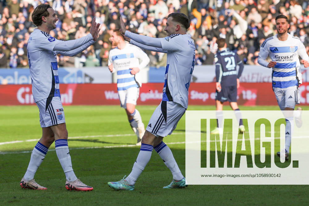 2025-02-16 PEC Zwolle v SC Heerenveen - Dutch Eredivisie ZWOLLE, NETHERLANDS - FEBRUARY 16: Dylan Vente of PEC Zwolle is celebrating their teams first goal with his teammate Ody Velanas of PEC Zwolle during the Dutch Eredivisie match between PEC Zwolle and SC Heerenveen at MAC3Park on February 16, 2025 in Zwolle, Netherlands. Zwolle MAC3Park Netherlands Content not available for redistribution in The Netherlands directly or indirectly through any third parties.