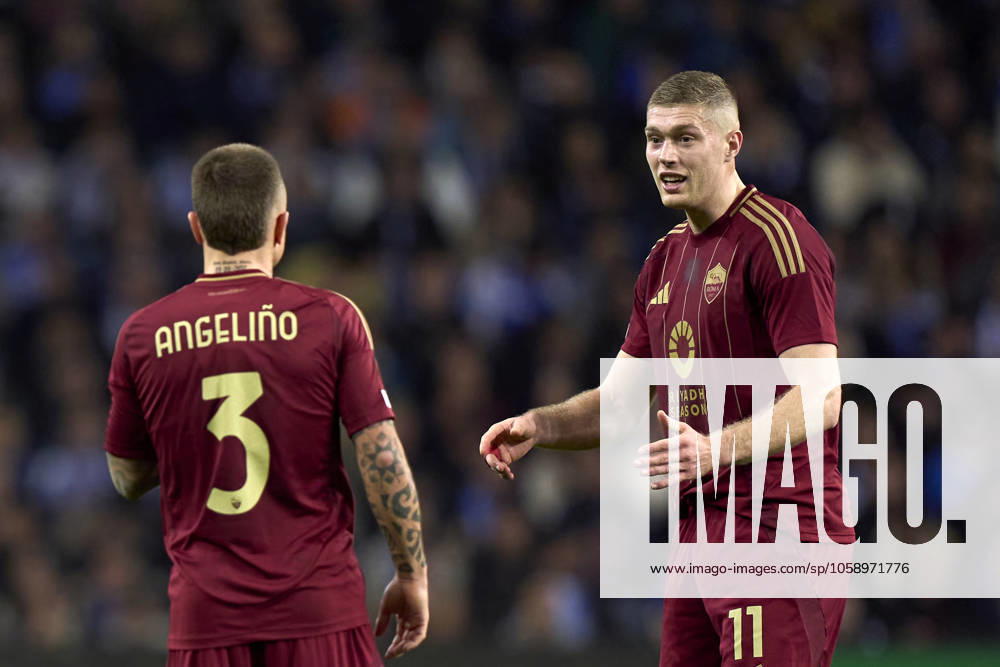 FC Porto v AS Roma - UEFA Europa League 2024 25 League Knockout Play-off First Leg Artem Dovbyk of AS Roma talks with Angelino of AS Roma during the UEFA Europa League Knockout phase play-offs 1st leg match between FC Porto and AS Roma at Estadio Do Dragao in Porto, Portugal, on February 13, 2025. UEFA Europa League Knockout phase play-offs1st leg match between FC porto and AS Roma at Estadio Do Dragao in Porto, Portugal, o Porto Portugal