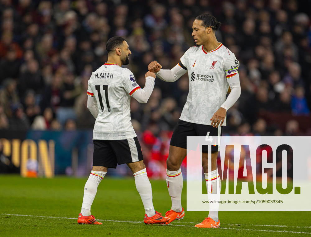 Football - FA Premier League - Aston Villa FC v Liverpool FC BIRMINGHAM, ENGLAND - Wednesday, February 19, 2025: Liverpool s Mohamed Salah (L) celebrates with team-mate captain Virgil van Dijk after scoring the first goal during the FA Premier League match between Aston Villa FC and Liverpool FC at Villa Park. (Photo by David Rawcliffe Propaganda) BIRMINGHAM Villa Park WEST MIDLANDS ENGLAND