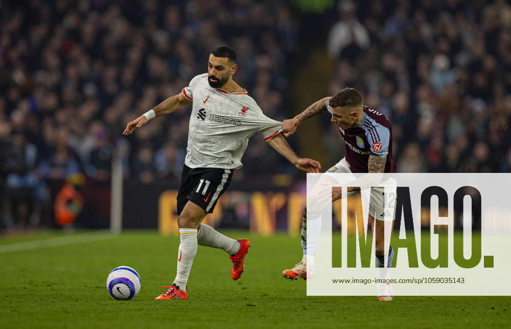 Football - FA Premier League - Aston Villa FC v Liverpool FC BIRMINGHAM, ENGLAND - Wednesday, February 19, 2025: Liverpool s Mohamed Salah (L) is challenged by Aston Villa s Lucas Digne during the FA Premier League match between Aston Villa FC and Liverpool FC at Villa Park. (Photo by David Rawcliffe Propaganda) BIRMINGHAM Villa Park WEST MIDLANDS ENGLAND