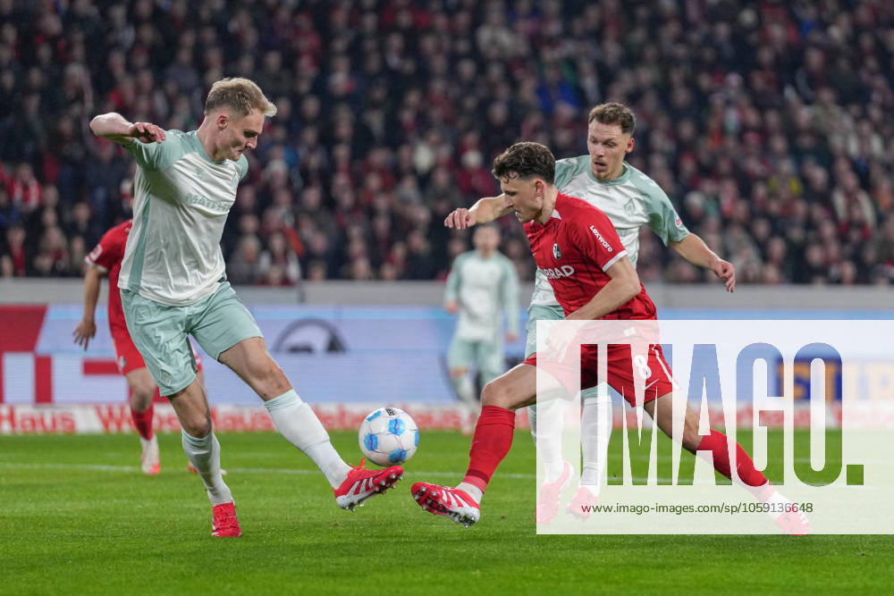 Amos Pieper SV Werder Bremen, 05 in duel with Maximilian Eggestein SC Freiburg, 08 , Soccer, 1 Bundesliga, Matchday 23, 2024 2025, SC Freiburg vs SV Werder Bremen, 21 02 2025, Europa Park Stadion, Freiburg, Germany DFL REGULATIONS PROHIBIT ANY USE OF PHOTOGRAPHS AS IMAGE SEQUENCES AND OR QUASI VIDEO Freiburg Europa Park Stadion Baden Württemberg Germany