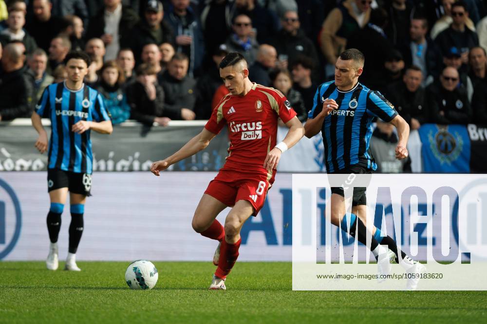 Standard s Sotiris Alexandropoulos and Club s Ferran Jutgla fight for the ball during a soccer match between Club Brugge and Standard de Liege, Sunday 23 February 2025 in Brugge, on day 27 of the 2024-2025 season of the Jupiler Pro League first division of the Belgian championship. KURTxDESPLENTER x113088577x