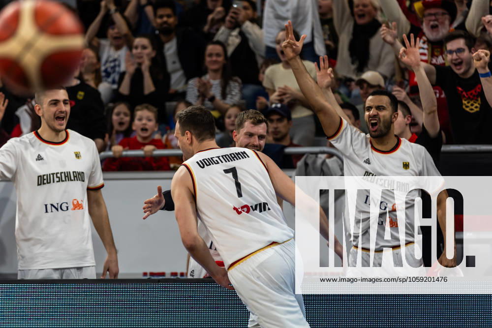 FIBA Basketball, EuroBasket Qualifiers 2025, Men Group D 23 02 2025, Germany Bulgaria Johannes Voigtmann Germany, No7 cheers with Johannes Thiemann Germany, No32 Copyright Alexander Trienitz
