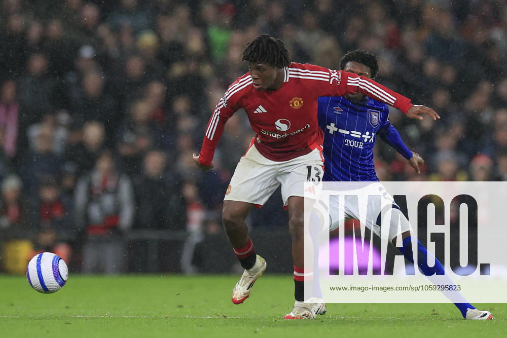Manchester United, ManU v Ipswich Town Premier League 26 02 2025. Patrick Dorgu (13) of Manchester United passes the ball during the Premier League match between Manchester United and Ipswich Town at Old Trafford, Manchester, England on 26 February 2025. Manchester Old Trafford Greater Manchester England Editorial use only DataCo restrictions apply See www.football-dataco.com ,