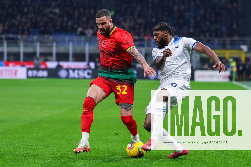 AC Milan vs SS Lazio Serie A 2024 25 02 03 2025 Kyle Andrew Walker of AC Milan competes for the ball with Nuno Tavares of SS Lazio during Serie A 2024 25 football match between AC Milan and SS Lazio at San Siro Stadium