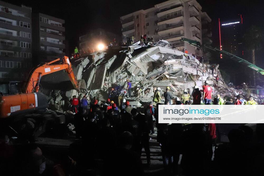 (201030) -- IZMIR (TURKEY), Oct. 30, 2020 -- Rescuers work at a site of a collapsed building after an earthquake in Izmir province of Turkey, Oct. 30, 2020. At least 12 people were killed and 438 others were wounded at a strong earthquake that hit Turkey s western province of Izmir on Friday, Turkish President Recep Tayyip Erdogan said. (Photo by Xinhua) TURKEY-IZMIR-EARTHQUAKE AydinxCetinkaya
