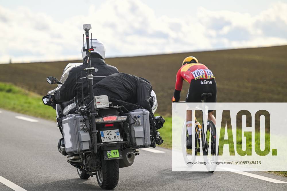 Paris - Nice 2025 - stage 2 BELLEGARDE, FRANCE - MARCH 10 : Illustration picture of a cameraman on a motorbike filming Abrahamsen Jonas (NOR) of Uno-X Mobility during stage 2 of the 83th edition of the Paris - Nice cycling race, a stage of 183,9km with start in Montesson and finish in Bellegarde on March 10, 2025 in Bellegarde, France, 10 03 2025 ( Motordriver Kenny Verfaillie - Bellegarde France