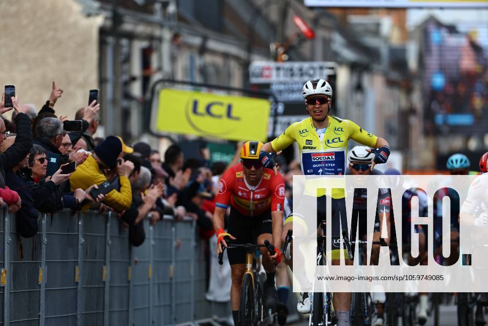Belgian Tim Merlier of Soudal Quick-Step celebrates as he crosses the finish line to win stage two of the 83th edition of the Paris-Nice cycling race, from Montesson to Bellegarde (183,9 km) in France, Monday 10 March 2025. DAVIDxPINTENS x114618872x