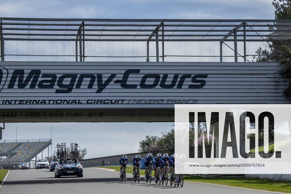 Soudal Quick-Step riders pictured during the warming up ahead of stage three of the 83th edition of the Paris-Nice cycling race, a 28,4km team time trial at the Nevers Magny-Cours racetrack, in Nevers, France, Tuesday 11 March 2025. DAVIDxPINTENS x114676792x