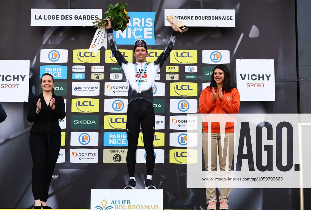 Portuguese Joao Almeida of UAE Team Emirates celebrates on the podium after winning stage four of the 83th edition of the Paris-Nice cycling race, 163,4km from Vichy to La Loge des Gardes, France, Wednesday 12 March 2025. DAVIDxPINTENS x114781832x