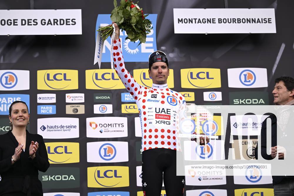 Paris - Nice 2025 - stage 4 LA LOGE DES GARDES, FRANCE - MARCH 12 : Almeida Joao (POR) of Uae Team Emirates - Xrg pictured with the polka dot jersey during the podium ceremony of stage 4 of the 83th edition of the Paris - Nice cycling race, a stage of 163,4km with start in Vichy and finish in La Loge Des Gardes on March 12, 2025 in La Loge Des Gardes, France, 12 03 2025 ( Motordriver Kenny Verfaillie - La Loge Des Gardes France