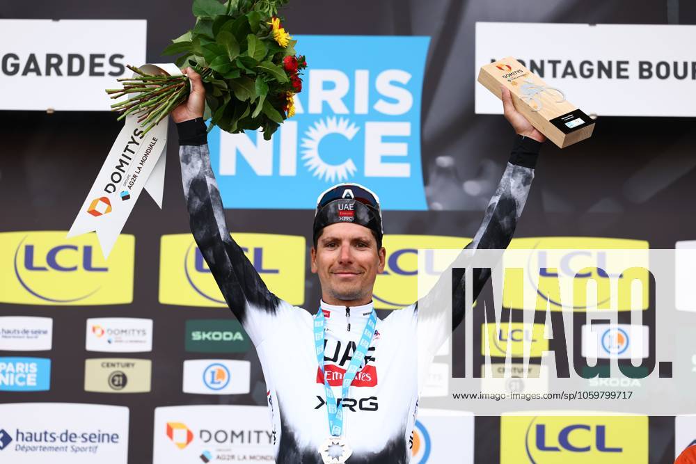 Portuguese Joao Almeida of UAE Team Emirates celebrates on the podium after winning stage four of the 83th edition of the Paris-Nice cycling race, 163,4km from Vichy to La Loge des Gardes, France, Wednesday 12 March 2025. DAVIDxPINTENS x114782046x